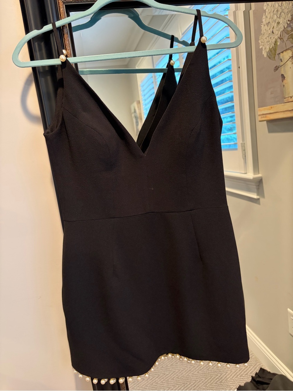Classic Black V-Neck Mini Dress with Pearl Hem